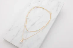 Halsband med pärlor - guld