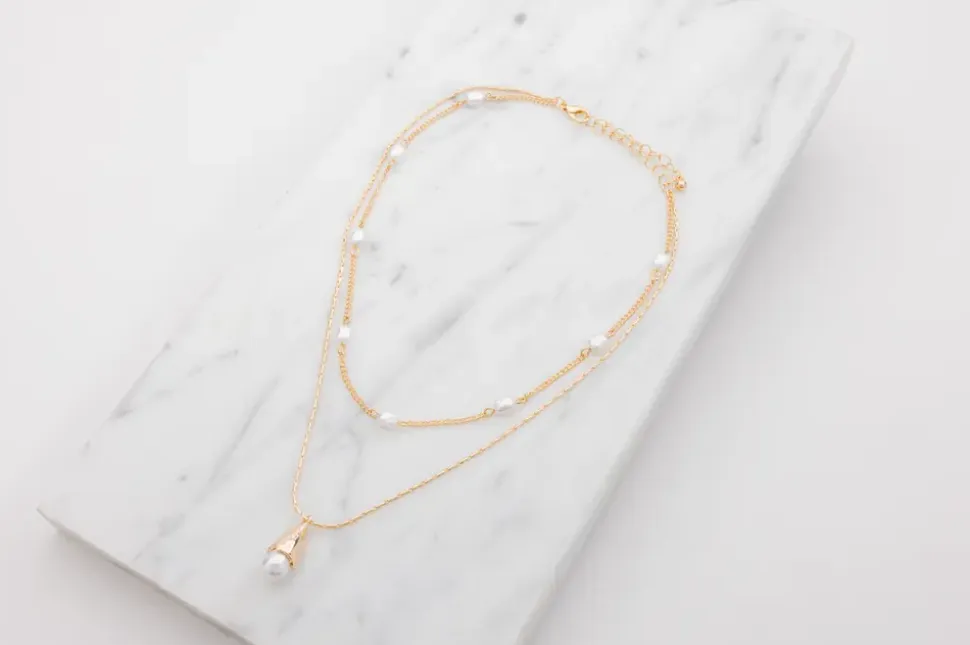 Halsband med pärlor - guld